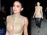 Kylie Jenner Stuns in Cleavage-Baring Look at The Moment Afterparty