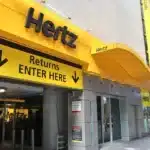Hertz Beats Q4 Revenue Expectations, Narrows Losses Amid Debt Woes