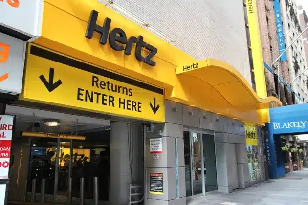 Hertz Beats Q4 Revenue Expectations, Narrows Losses Amid Debt Woes