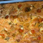 Easy Focaccia Recipe: Confit Garlic & Tomatoes Elevate Flavor
