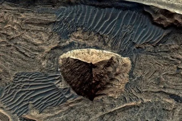 Mysterious Three-Sided Pyramid on Mars Sparks Alien Theories