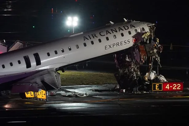 Pilots Killed as Air Canada Jet Hits Fire Truck at LaGuardia
