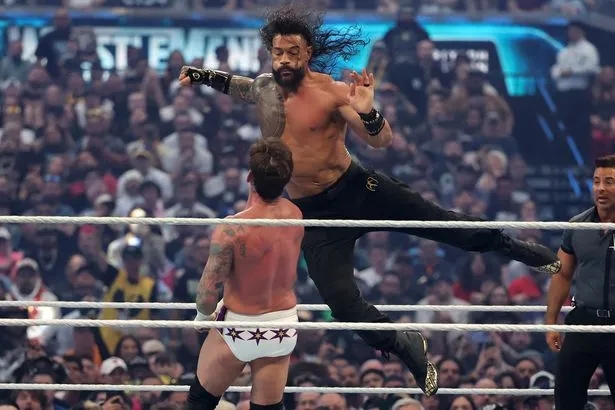 WrestleMania Night 2 Results: Lesnar Retires, Reigns Tops Punk
