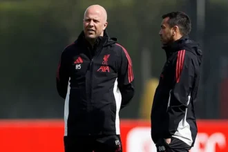 Feyenoord Targets Van Bronckhorst from Slot’s Liverpool Staff