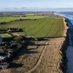 Coastal Erosion Threatens Historic Graves and Village Landmarks