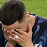 Player Red Carded for Covering Mouth Under New Rule
